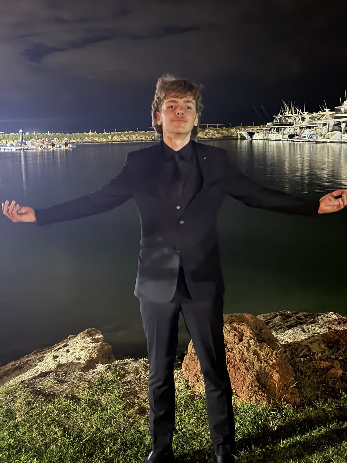 Portrait by the waterfront at night